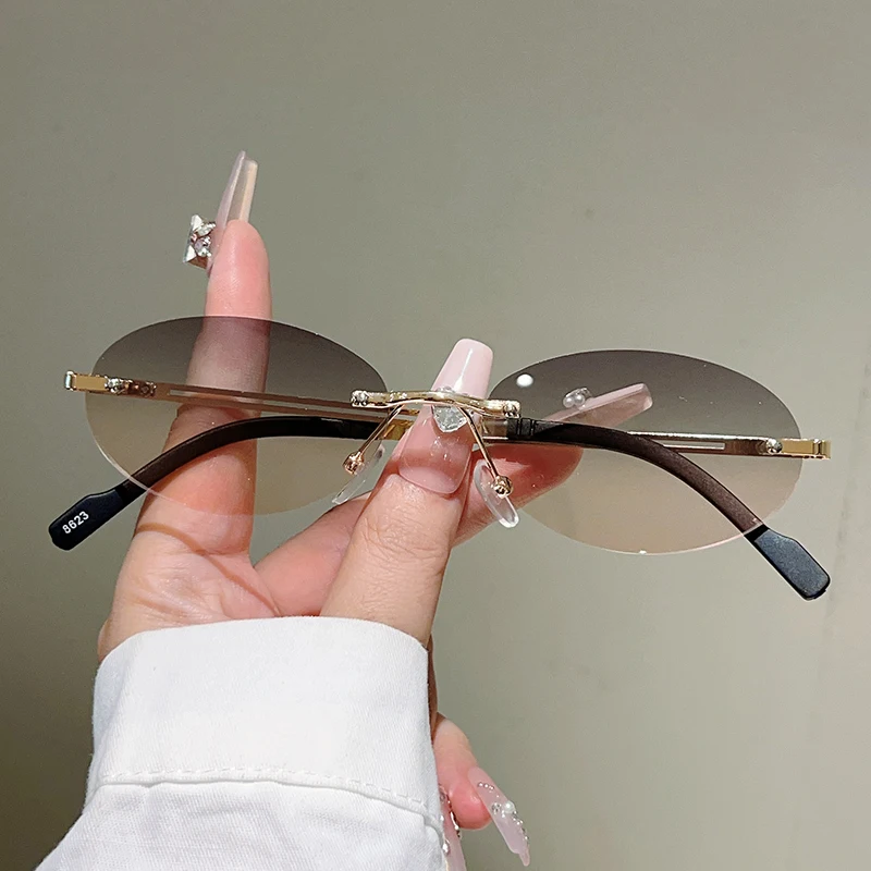 Vintage Outdoor Fashion - Rimless ovale zonnebrillen voor dames, modieus